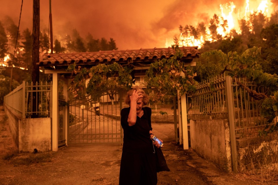Residents Evacuate Greek Island Hit By Wildfires