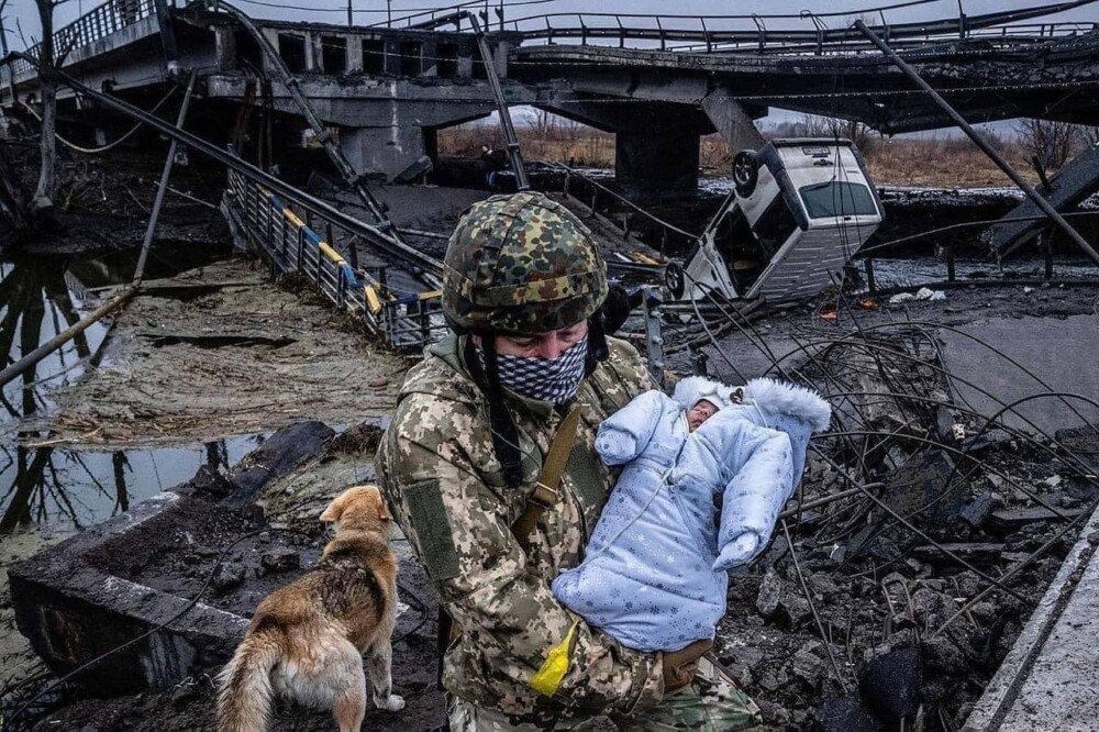 2022 03 05 Voluntary Ground Defense Figther Rescues A Baby In Irpin Near Kyiv Ukraine