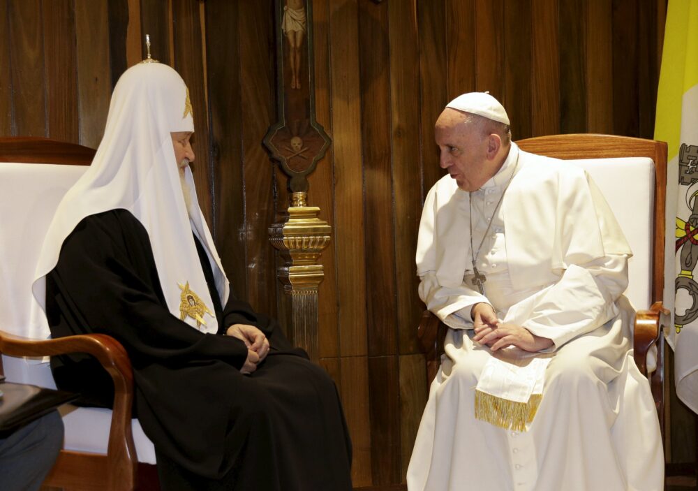 Russian Orthodox Patriarch Kirill (L) and Pope Francis talk during a meeting in Havana