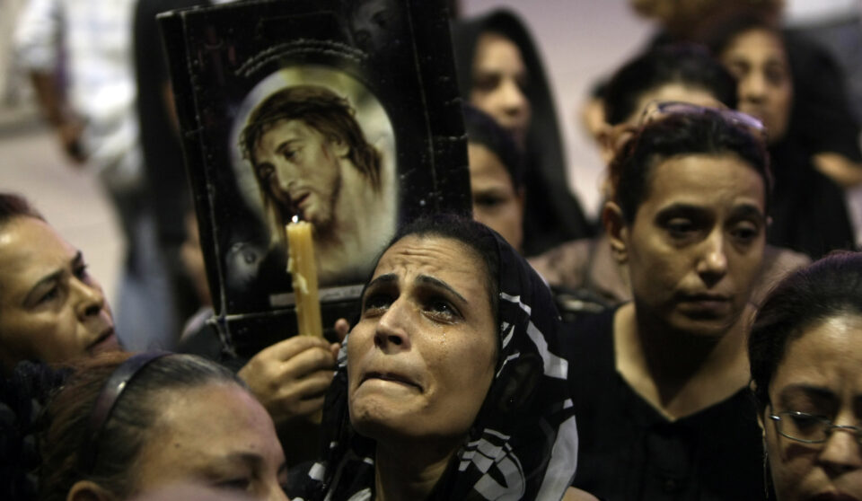 Coptic Egyptians attend a service at the
