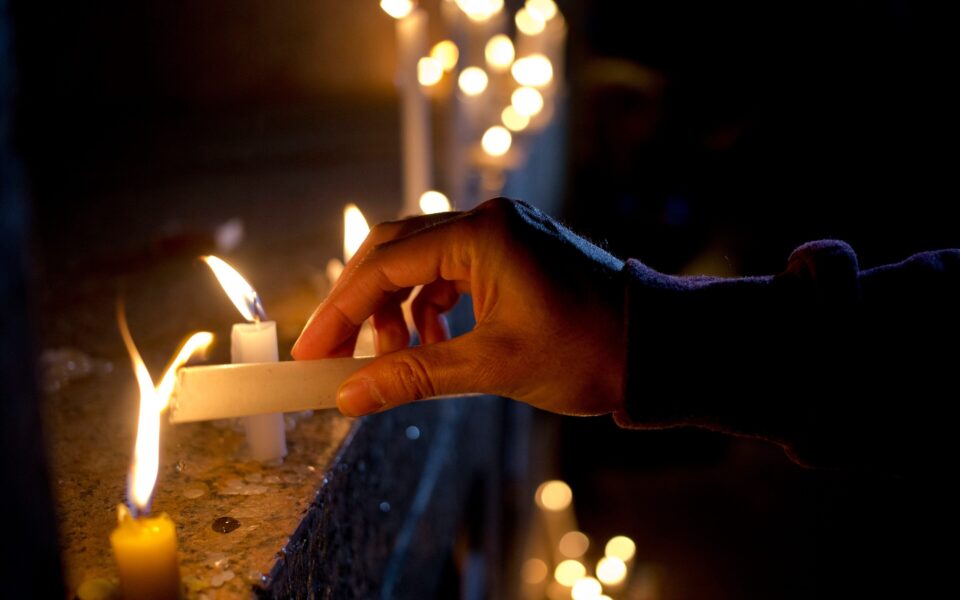 100512258 A Man Lights A Candle During A Vigil In Front Of The Us Embassy To Remember The Victims Of Trans Nvbqzqnjv4bqzgekzx3m936n5bqk4va8rwtt0gk 6efzt336f62ei5u