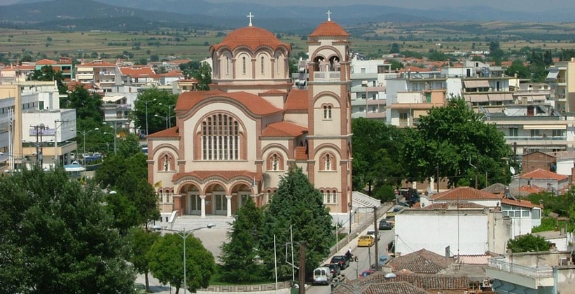 κομ