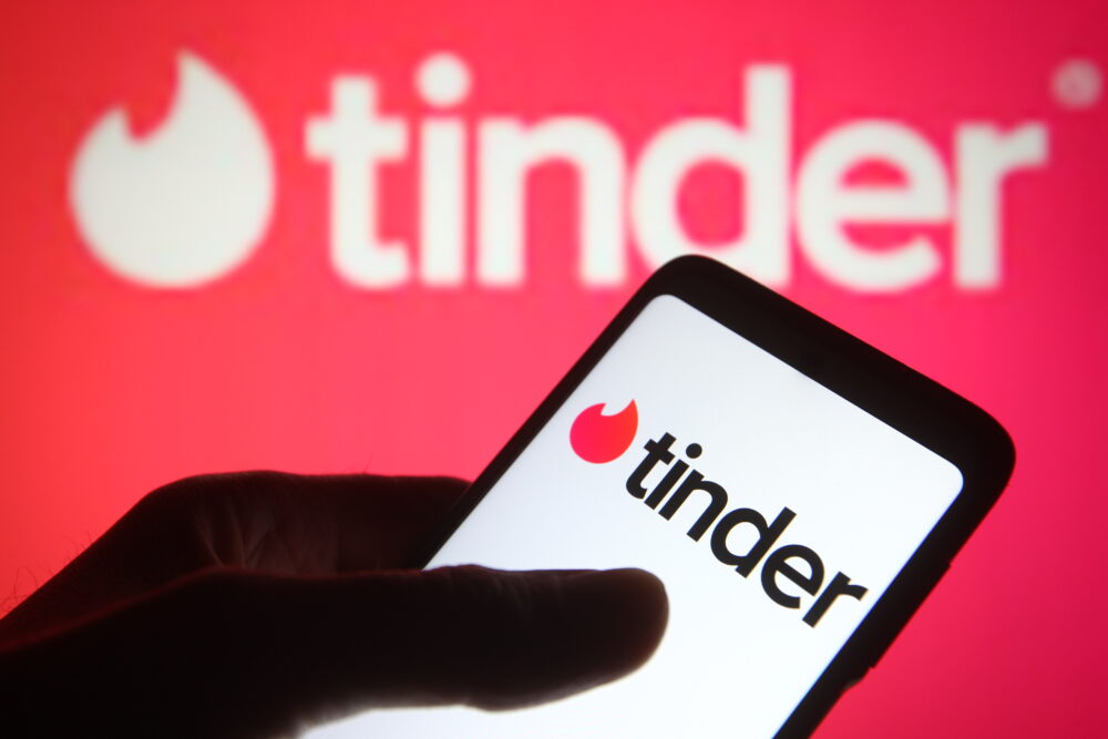 In this photo illustration the Tinder logo of an US