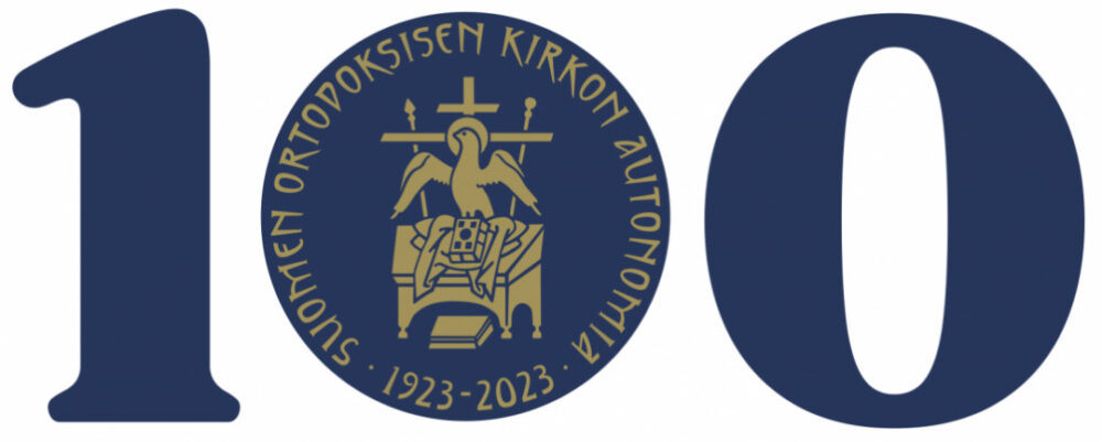 Tomos 100 juhlavuosi logo nimio Suunnittelija Ulriikka Haahti