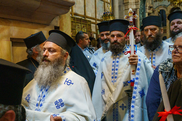 The Entourage Of The Greek Patriarch Walks Into The Church