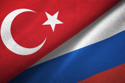Russia And Turkey Two Flags Together Textile Cloth Fabric Texture